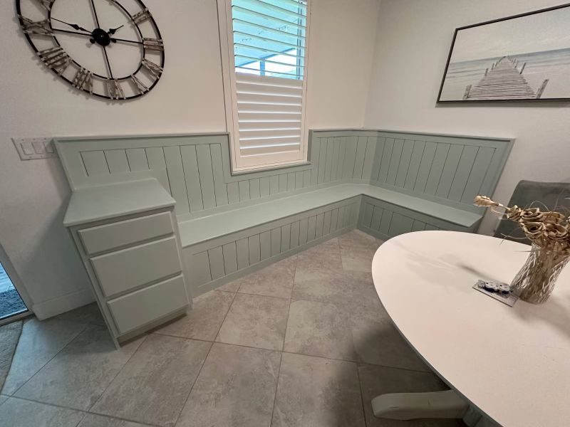 Built-in breakfast nook banquette with board and batten panelling
