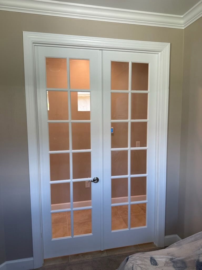 Interior french doors with custom casing and trim