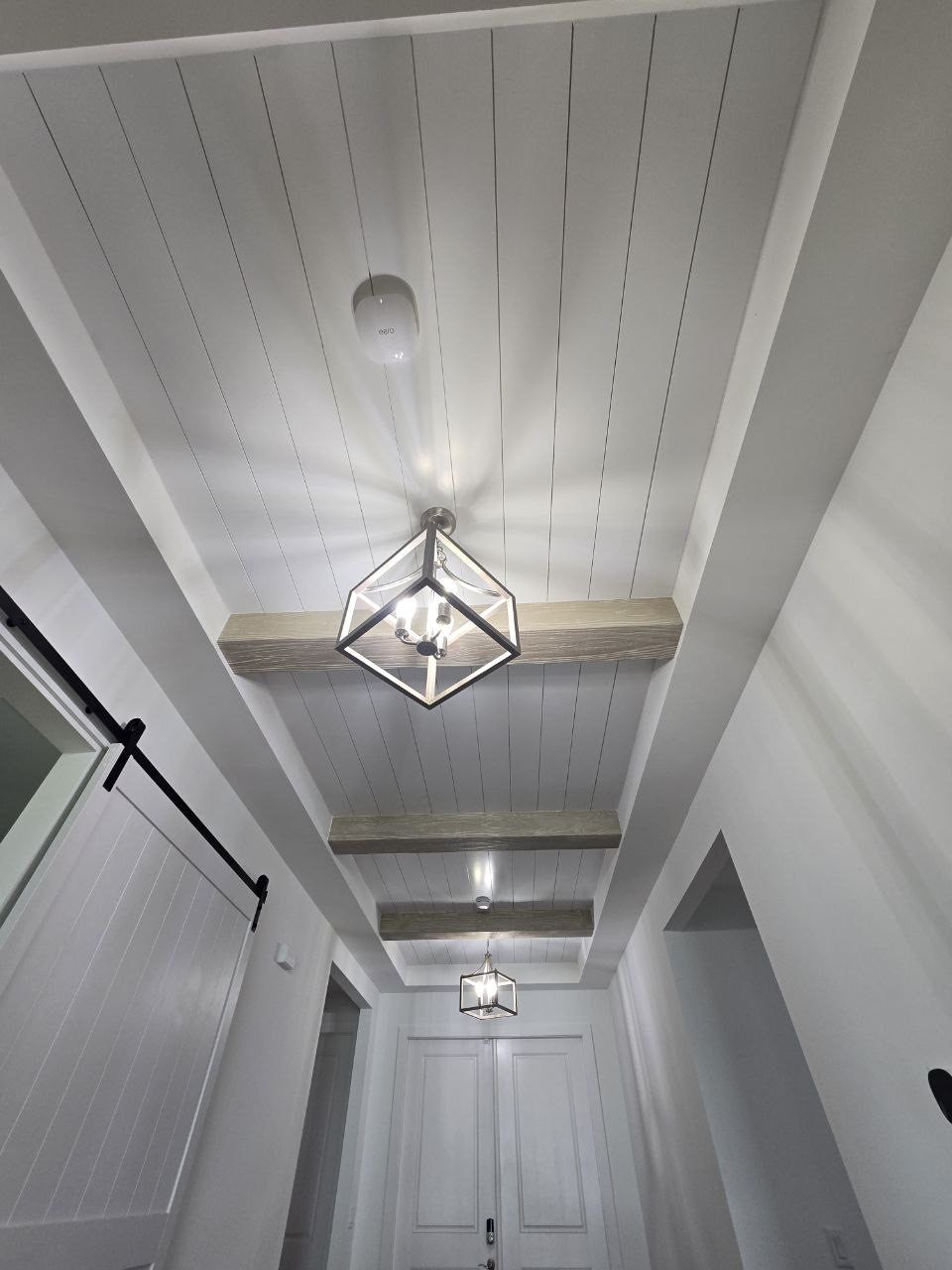 Shiplap ceiling and trim in a hallway